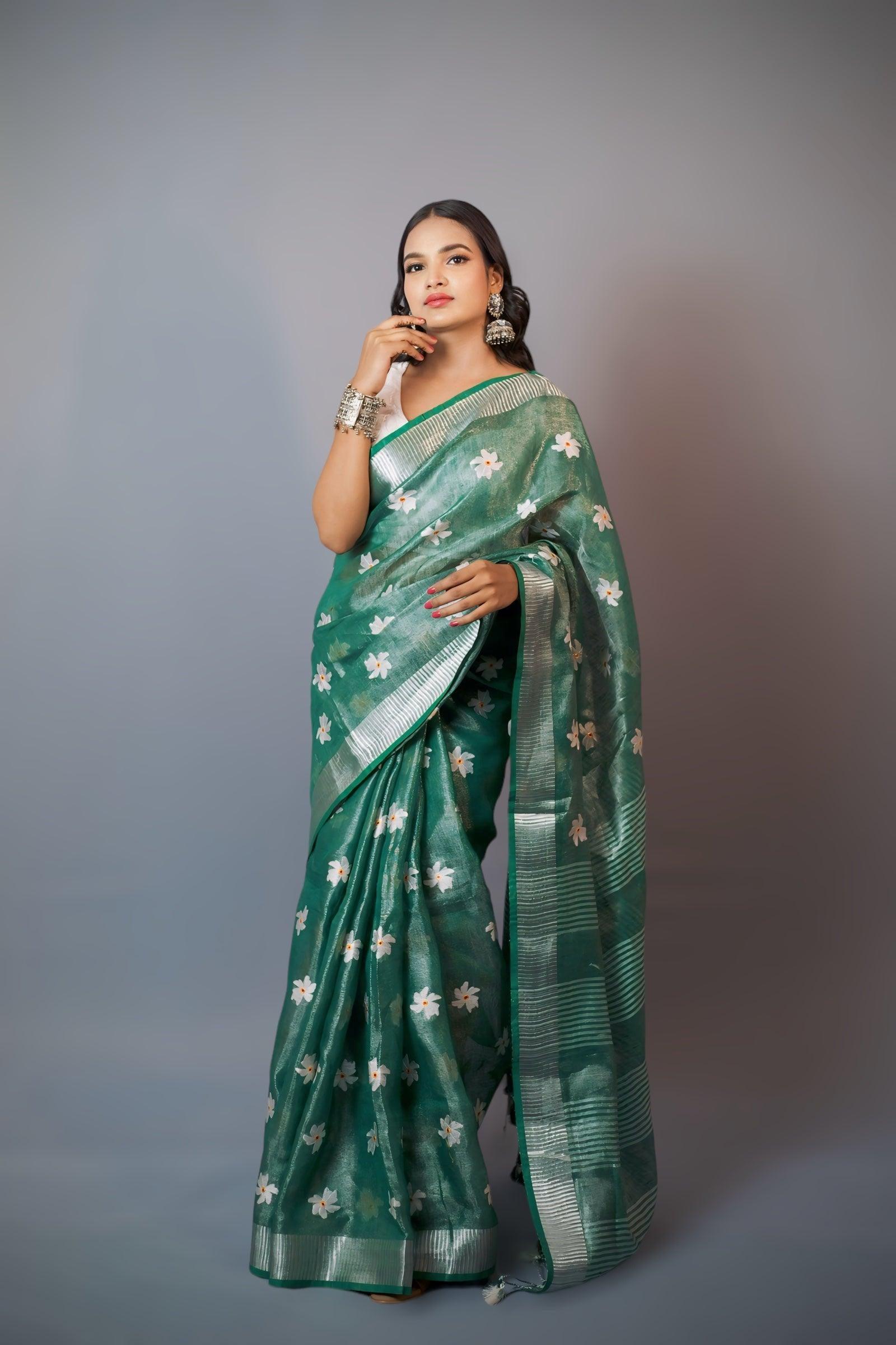 Green Tissue Linen saree with white flower embroidery - first