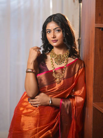 Chitra | Metallic Orange handwoven tissue saree with Temple Border