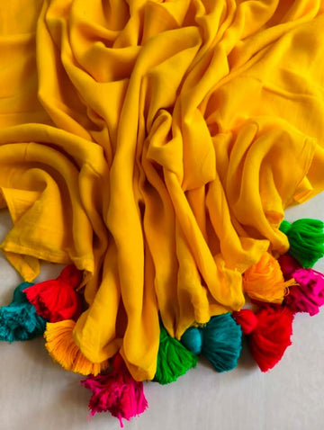 Yellow Mul cotton saree with big pompom hanging