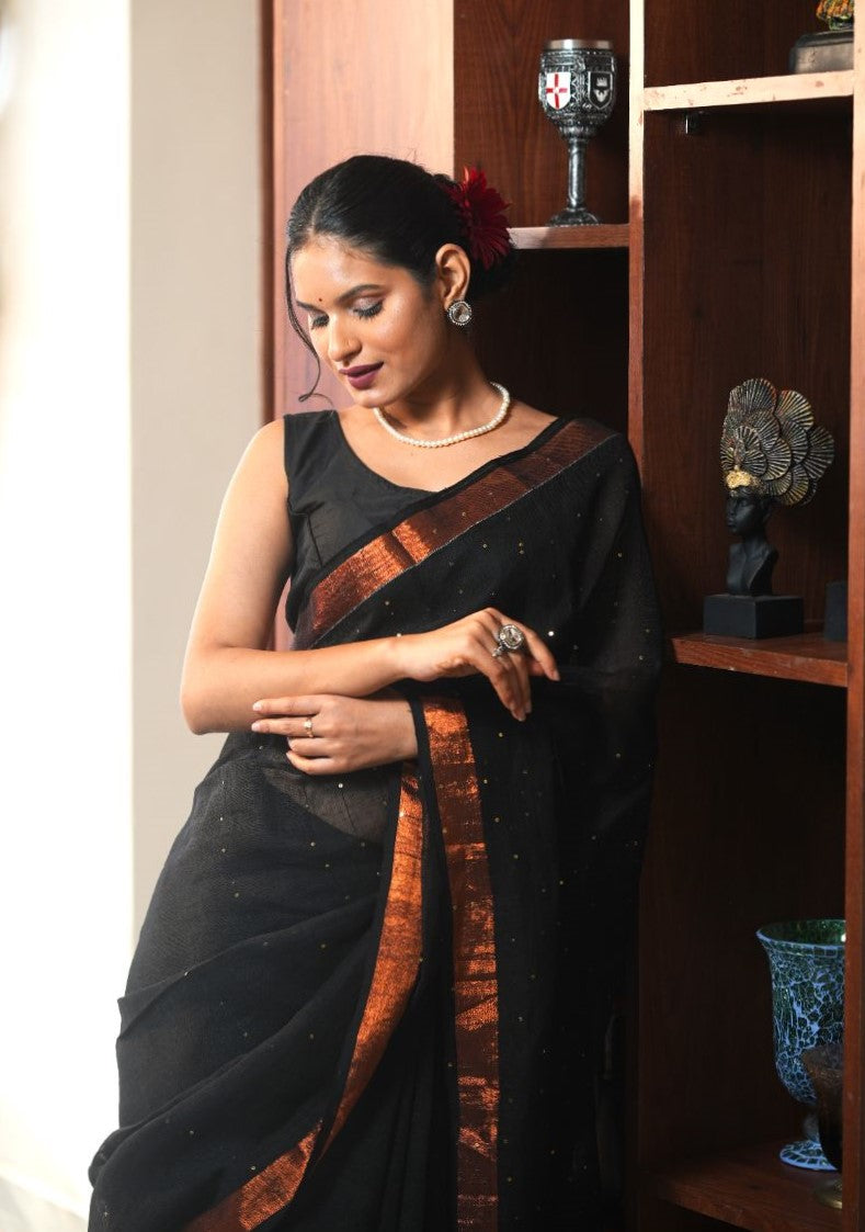 Mahika| Black linen saree with golden zari & sequin highlights