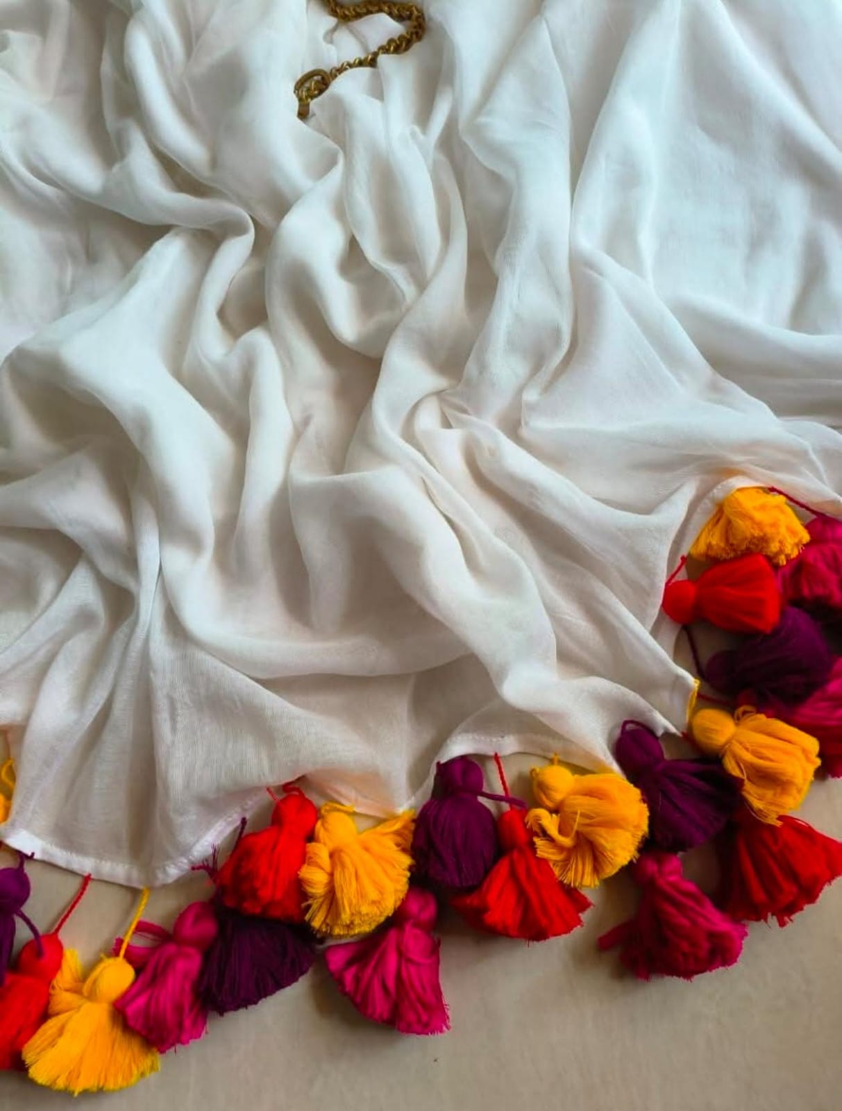 White Mul cotton saree with big pompom hanging